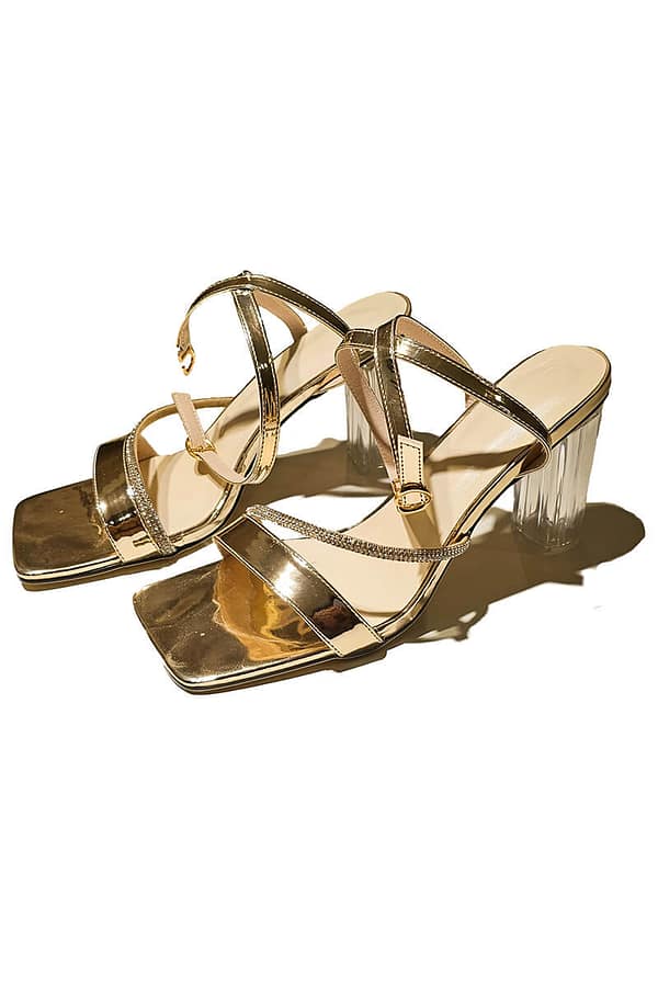 Sandalias Ankle Strap Doradas con tacones transparentes